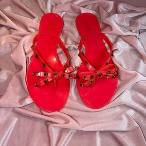 Aldo Bright Coral Jelly Flip Flops w/ Bow & Gold Stud Accents – Size 8
